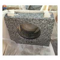 China cheap light spray white granite vanity top